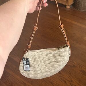 The Sak Crocheted Cream Shoulder Bag with Tan Leather Strap